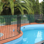 Wrought iron security fence is the most commonly installed fencing around our pools
