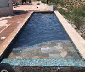Beach Entry Pool, Electric Pool Cover, Glass Waterline Tile, Quartzite Coping Beach Entry Pool, Electric Pool Cover, Glass Waterline Tile, Quartzite Coping