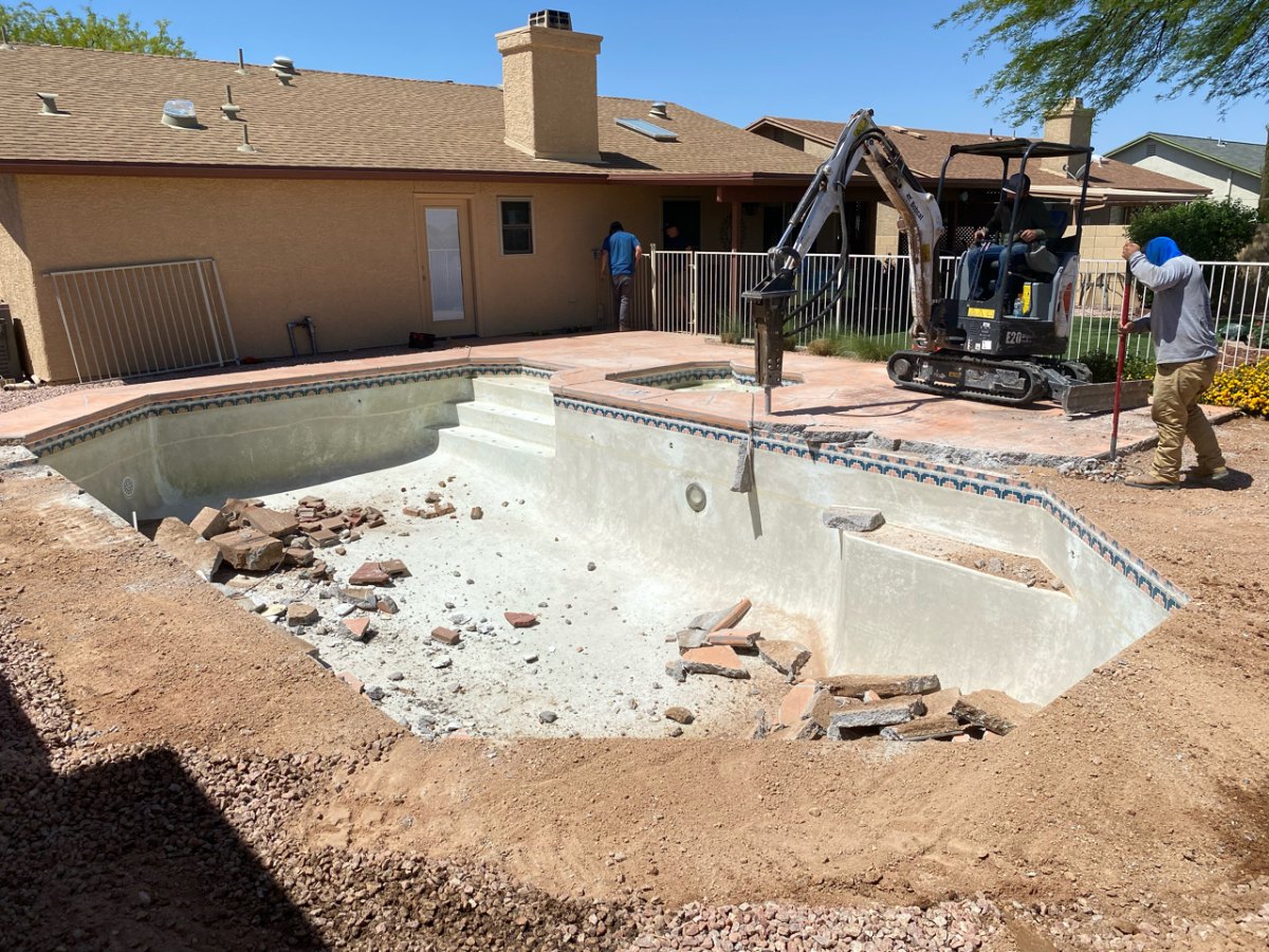 Pool deck demolition in progress