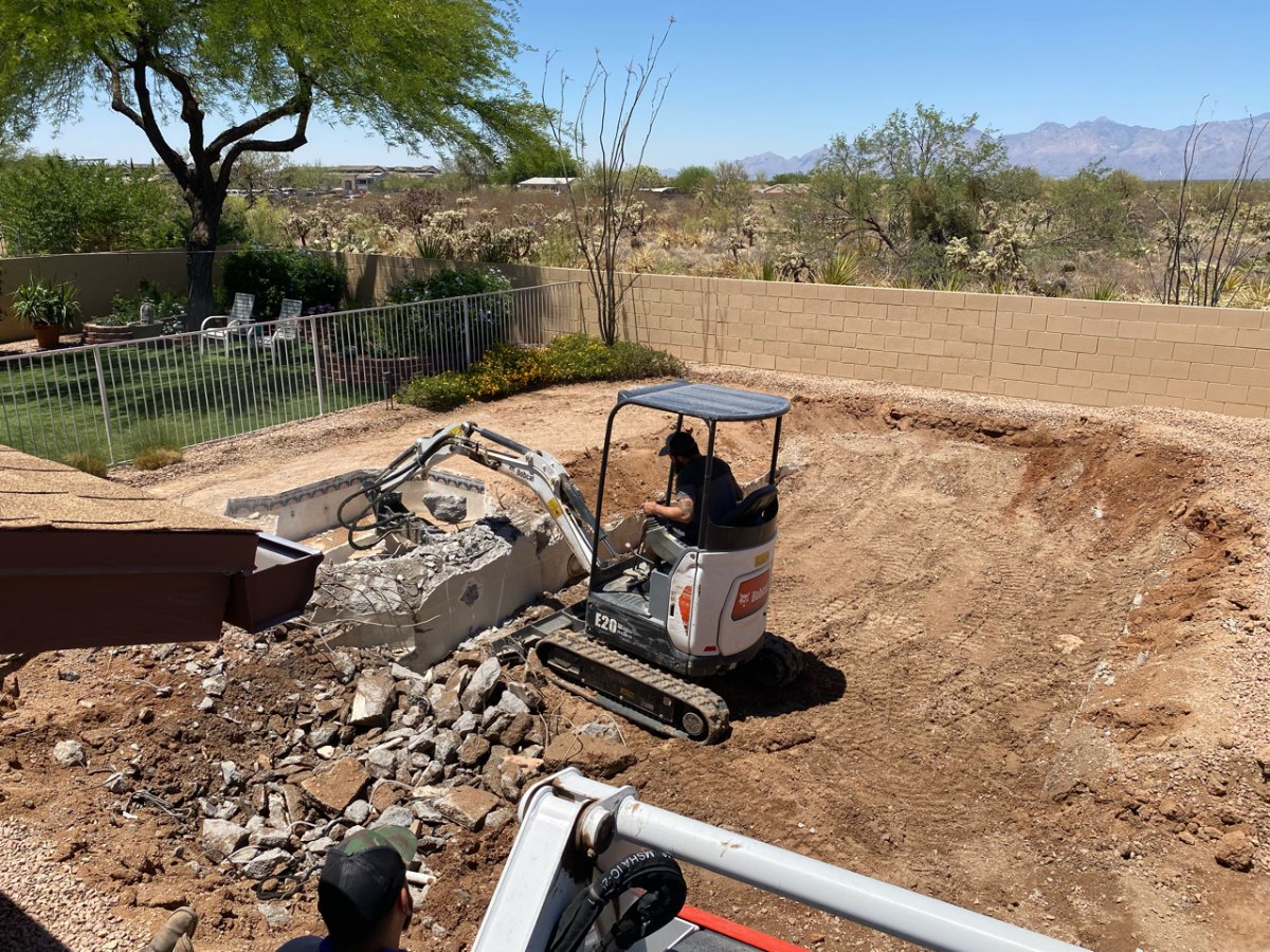 Compacting fill over a former pool